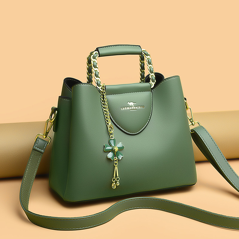 Nueva moda de hombro de las mujeres costura pequeño tamaño exquisito cubo bolsa de gran capacidad de cuero suave de una sola pieza de entrega para mamá más joven