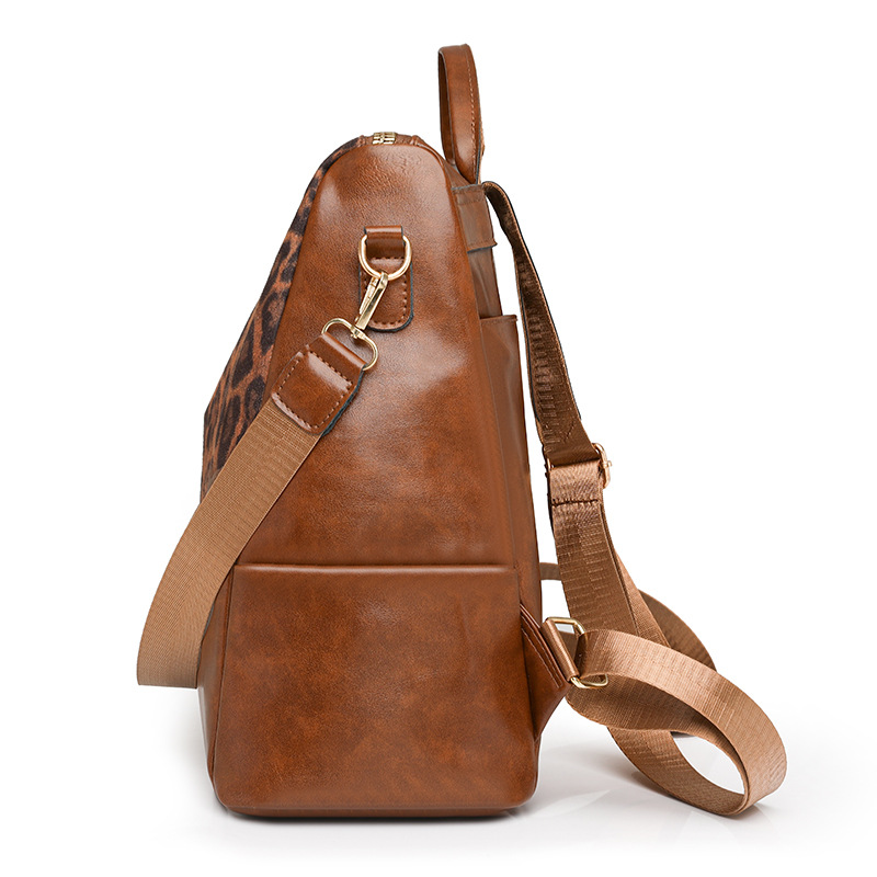 Comercio exterior al por mayor 2025 nuevo estilo estampado de leopardo contraste color damas PU mochila de viaje multifuncional de moda