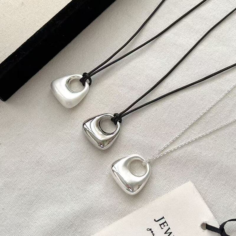 Korean Blogger's Same Style Silver Bag Pendant Long Necklace Niche Simple High-End Versatile Black Rope Sweater Chain
