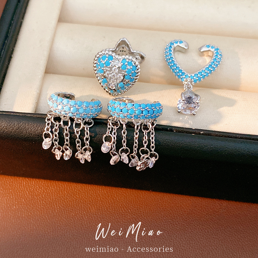 Zircon azul en forma de corazón de pentagrama estrellas de bordas de orejas para mujeres sin agujeros de orejas personales pendientes de nicho lujosos de alto nivel