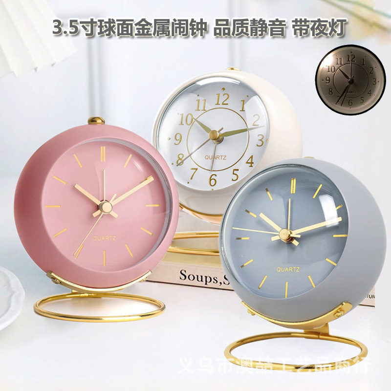 Manufacturer Wholesale Metal Silent Alarm Clock with Luminous Light, Creative Convex Surface, Gold Stamping, Student and Children's Desktop Alarm Clock