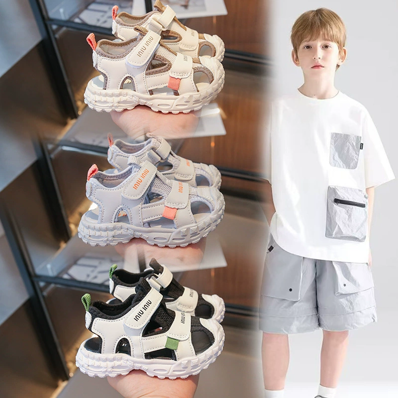 Детские сандалии Баотоу 2025 Новый летний мальчик дышащая спортивная пляжная обувь для девочек сокровище одиночные сетчатые туфли полые дети