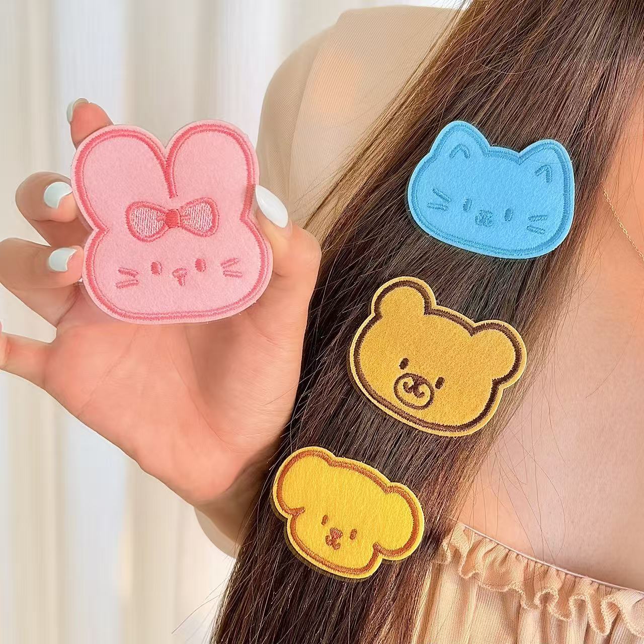 Cartoon animal embroidery hair clips: bear, rabbit, and cat designs, with Velcro fasteners, for girls, used to organize and secure stray hairs