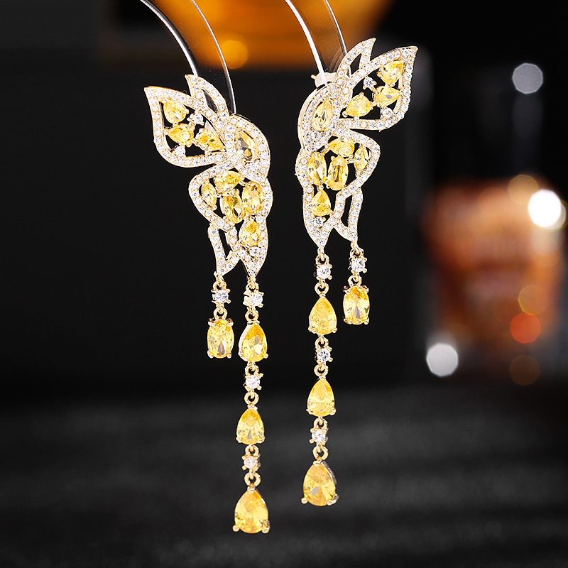Boucles d'oreilles en argent S925 avec aiguille Ankara et zircon rouge Boucles d'oreilles en forme de goutte d'eau à longues franges en forme de papillon_voghion.com