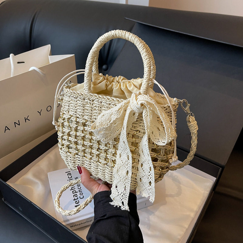 春夏季新款編織菜手提籃子包包女2024時尚鏤空設計小眾草編單肩包