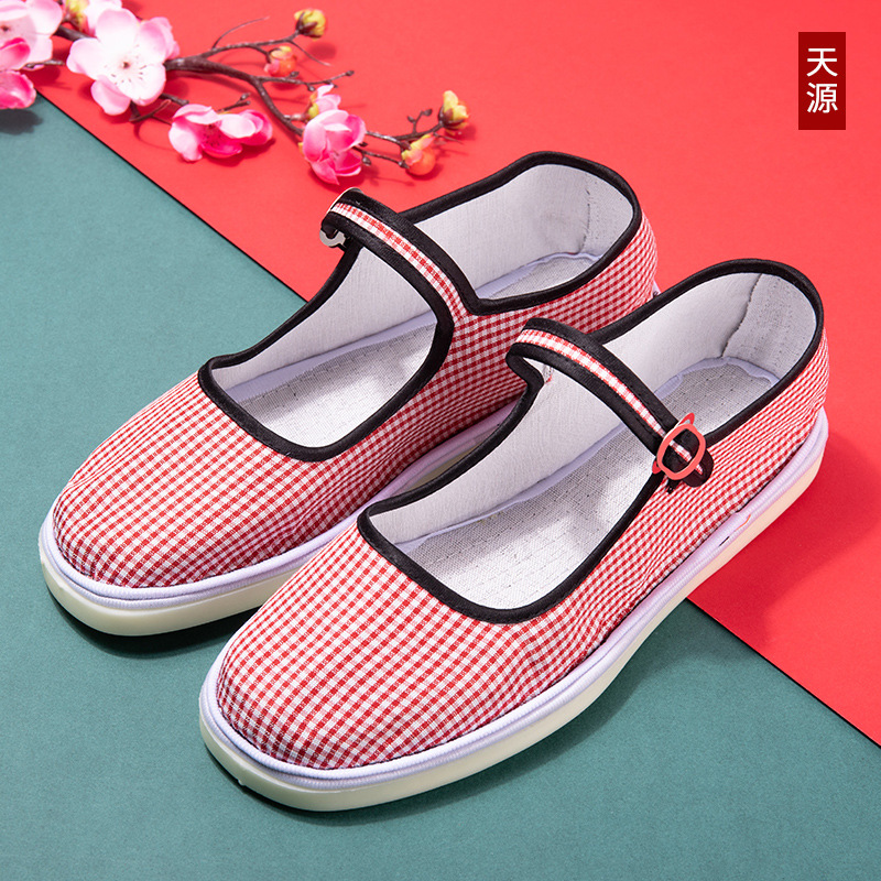 Zapatos casuales viejos de Beijing zapatos cosidos con suela de tendón de res tela de algodón boca baja suela plana suela de tendón de res zapatos de madre para mujer suela suave primavera y otoño