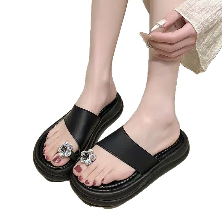 2026 verano nuevo estilo simple de moda de vacaciones de hadas sandalias de playa de viento de dedos de los dedos para usar zapatillas frías para mujeres
