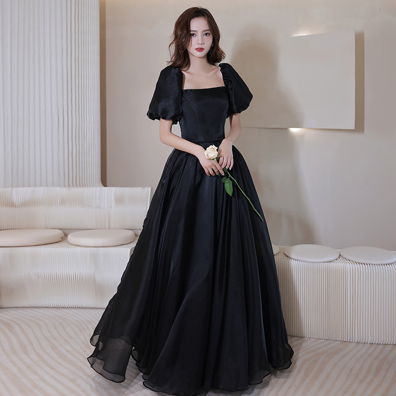 Vestido de noche negro para mujer, estilo nuevo de otoño 2025, manga abullonada, satén, para anfitriona de reunión anual, pasarela