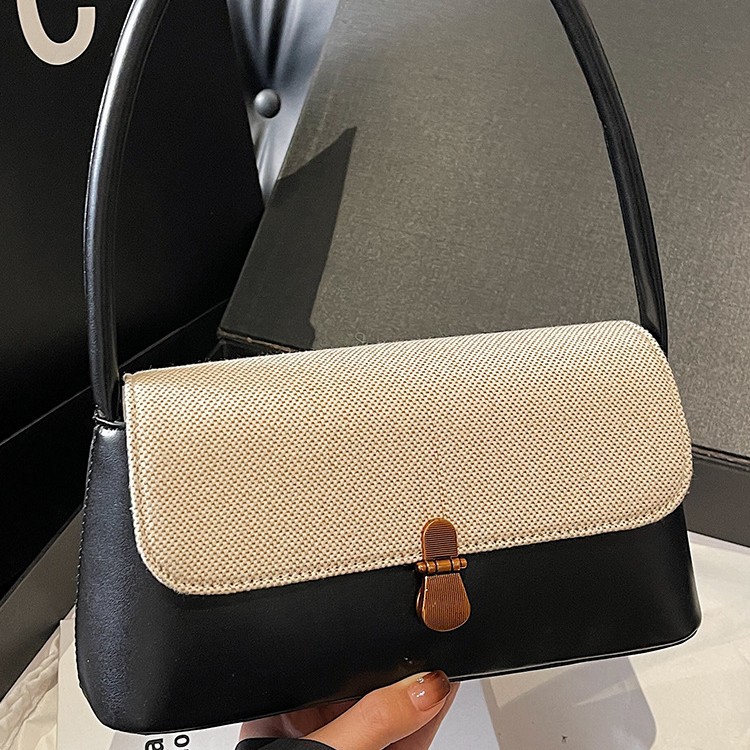 Retro nicho de viaje bolsos de brazo bolsos de mujer 2026 primavera bolsos de hombro diarios de moda bolsos de mano de alto valor
