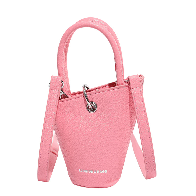 Bolso de cubo de diseño de nicho 2025 verano nuevo bolso de hombro con patrón de lichi mini bolso de mensajero de letras mujer