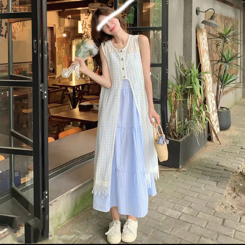 Designed with a Tassel Hem and High Slit, This Long Sleeveless Knit Cardigan for Women Is Perfect for Summer Layering with a Thin Hollow-Out Overlay Designed with a Tassel Hem and High Slit, This Long Sleeveless Knit Cardigan for Women Is Perfect for Summer Layering with a Thin Hollow-Out Overlay