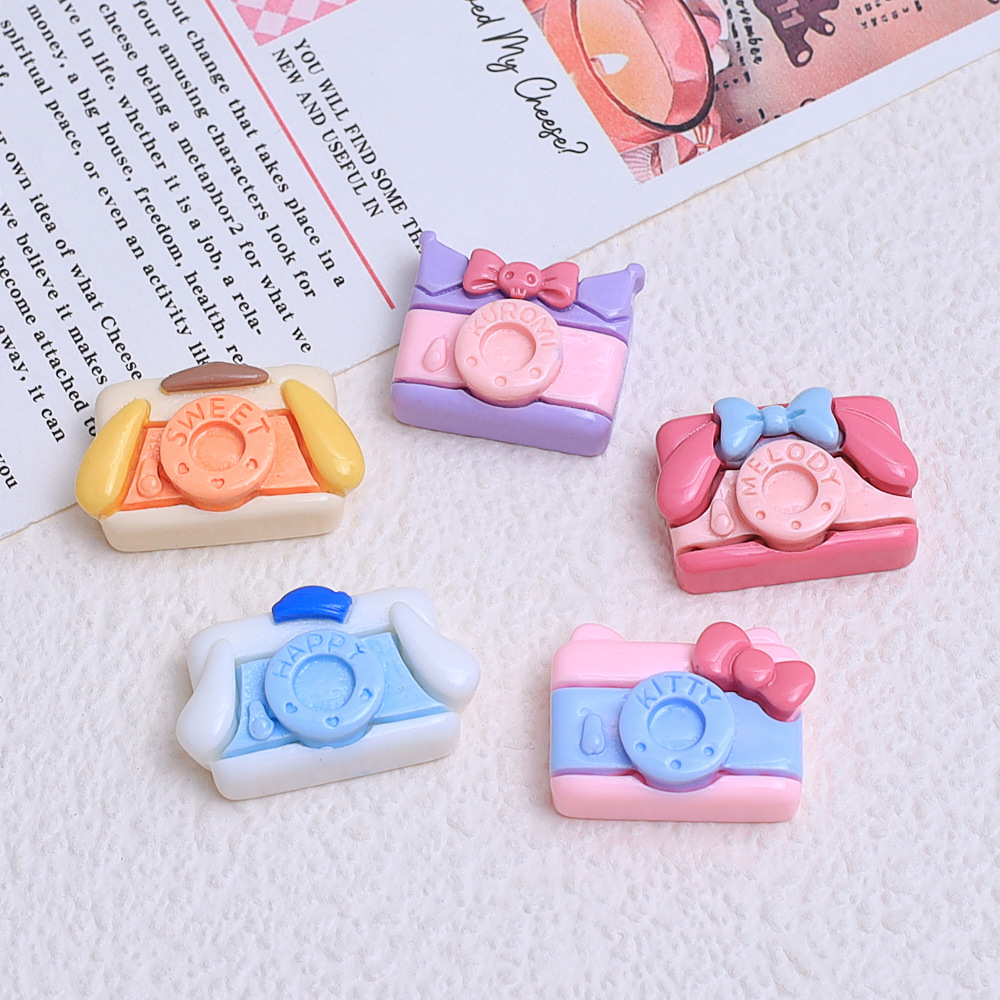 Dibujos animados pequeña cámara transmisión en vivo caliente DIY pegamento crema teléfono móvil Shell joyería accesorios de resina horquilla al por mayor