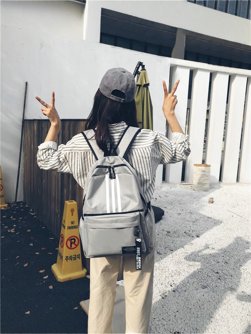 Simple and Stylish Backpack for Men and Women, Large Capacity, Lightweight Travel School Bag, Waterproof Nylon Couple Backpack, New Model