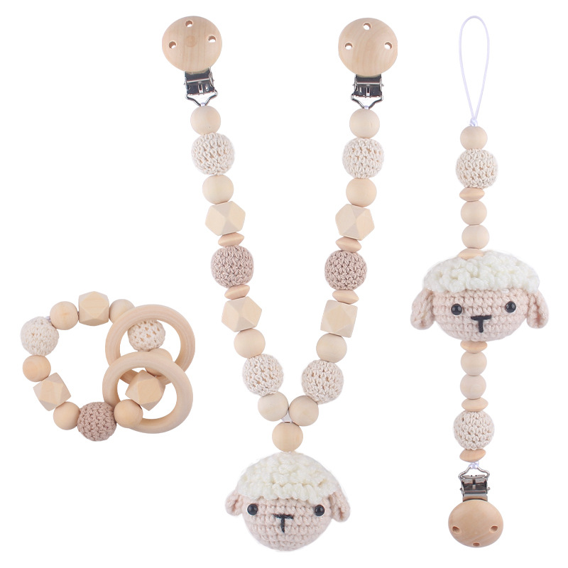 Nuevo bebé suministros de dibujos animados animal jirafa ovejas calmante bebé chupete cadena coche colgando traje de tres piezas