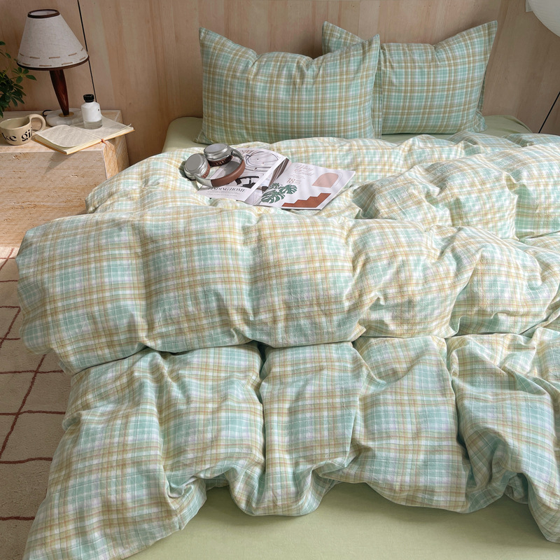 Una clase de algodón cuatro piezas de tejido de agua lavado sábanas de algodón cubierta dormitorio de estudiantes cama de tres piezas de impresión y teñido activo