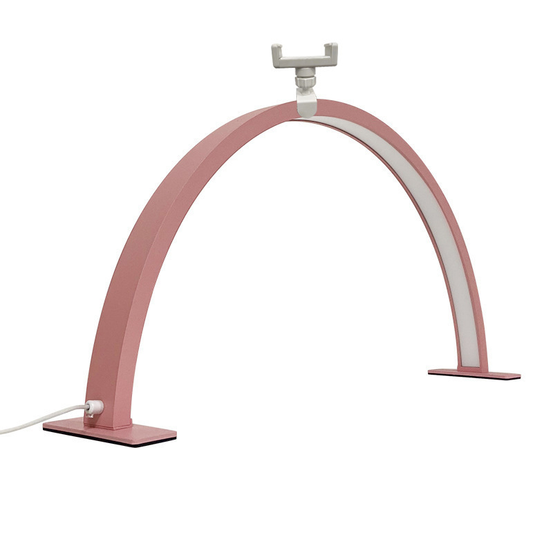 Transfronterizos media luna belleza manicura lámpara de cinta perforación soporte sin sombra luna curva belleza lámpara manicura luz de mesa belleza