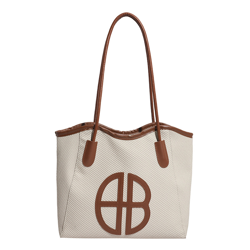 Bolsa de brazo de gran capacidad para viajar 2026 nueva moda bolso de mujer de alto nivel nicho bolso de hombro bolso especial para mujeres