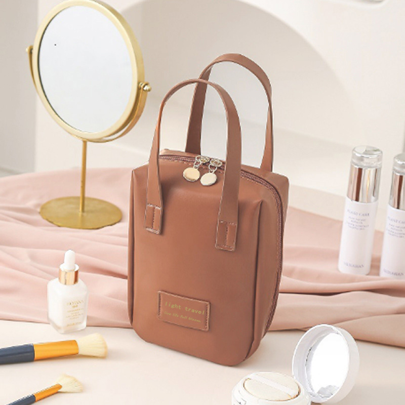 Nueva bolsa de cosméticos portátil de gran capacidad bolsa de almacenamiento de cuidado de la piel maquillaje cepillo de viaje bolsa de lavado bolso de cuero
