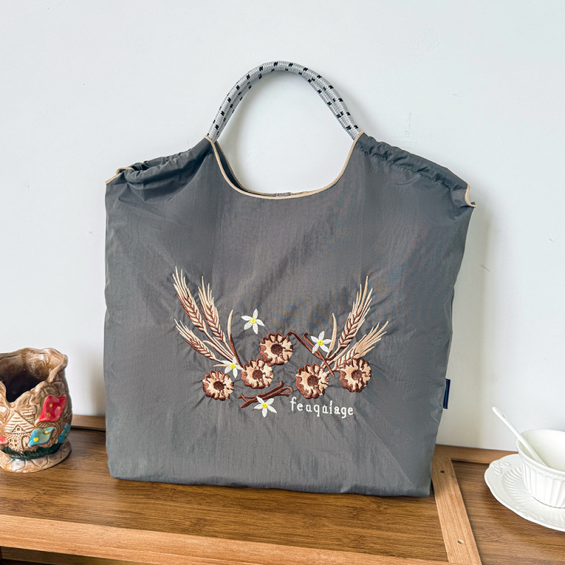 新しい日系ボールチェーン刺繍百合レジ袋小衆万針刺繍ナイロンハンドバッグ環境保護袋|undefined