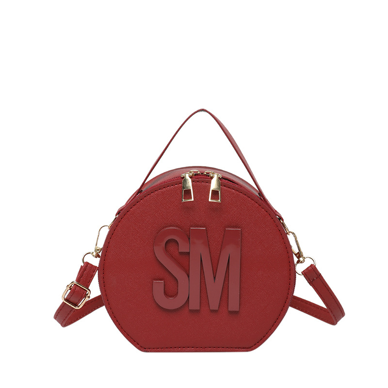 2025 primavera nueva impresión de letras de moda redondas personalidad simple nicho ocio mochila de tendencia de mujer viaje