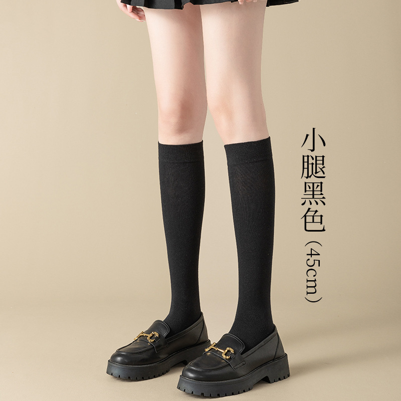 Calcetines de pantorrilla Calcetines de algodón puro de primavera y verano para mujer Calcetines de tubo jk de tubo de estufa de presión para niños Calcetines por encima de la rodilla en blanco y negro Calcetines Zhuji al por mayor