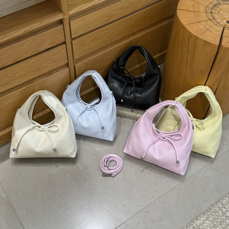 Bolsa de mano de arco dulce coreano, exquisito cinturón de nubes, bolso de mochila encantador, fresco y versátil, bolso de moda