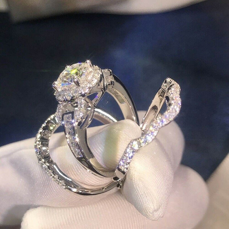 Cao Shi übertreibt das kreisförmige Taubenei mit drei Ringsätzen, die für Paare und den Valentinstag sehr aufmerksam sind_voghion.com