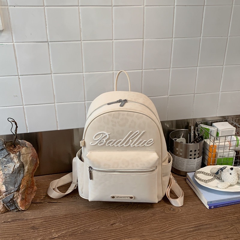 Estudiantes exquisitos nicho nuevo mochila 2026 popular mochila de hombro para viajar estampado de leopardo simple mujer gran capacidad de verano