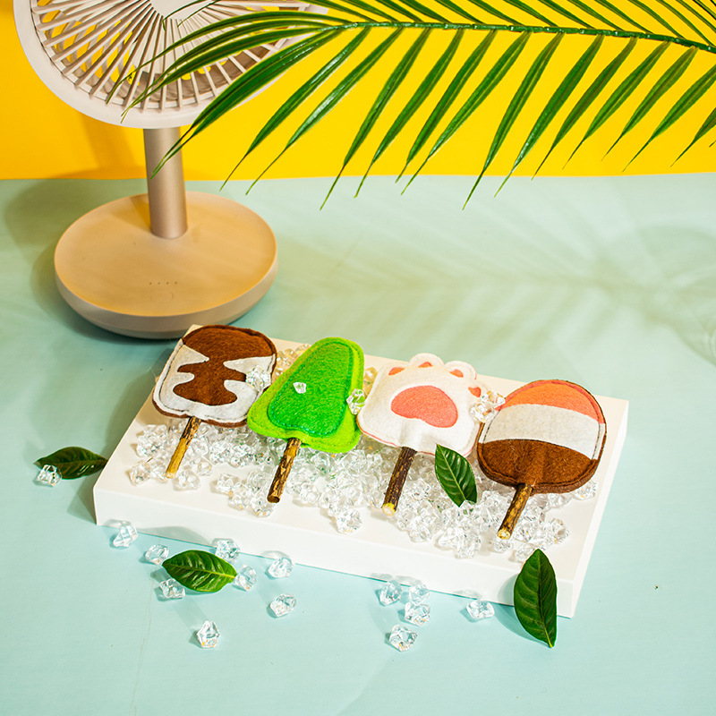 Juguete para mascotas fieltro Polygonum multiflorum posicle gato traje de juguete limpieza gato cavidad oral en stock que contiene catnip