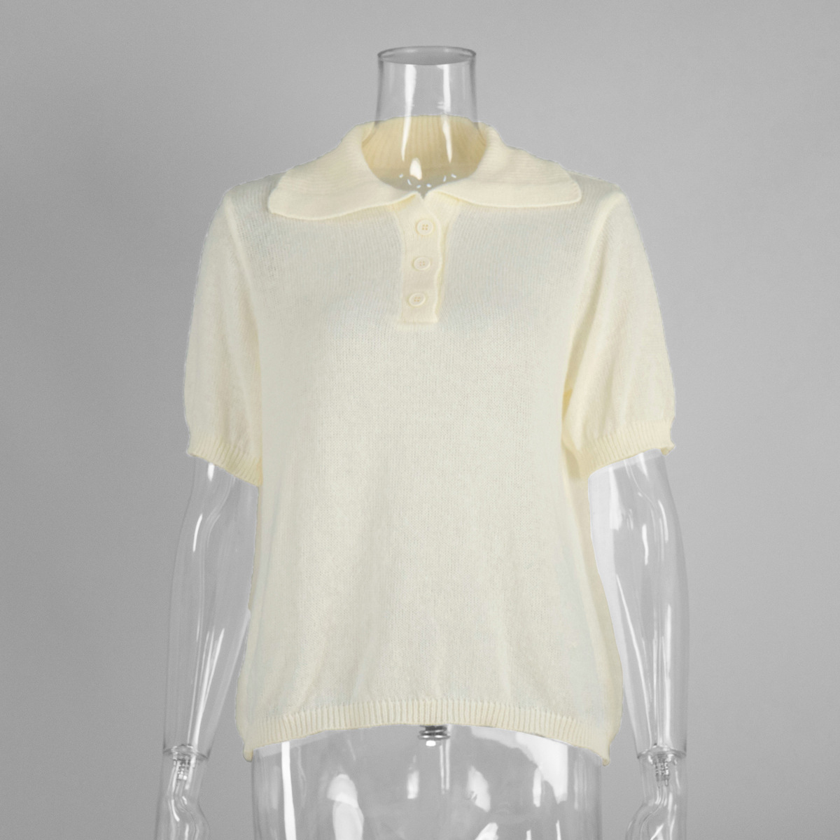 Suéter de manga corta de punto hueco Polo transfronterizo 2025 primavera y verano nueva camiseta de manga abullonada suéter de punto simple mujer