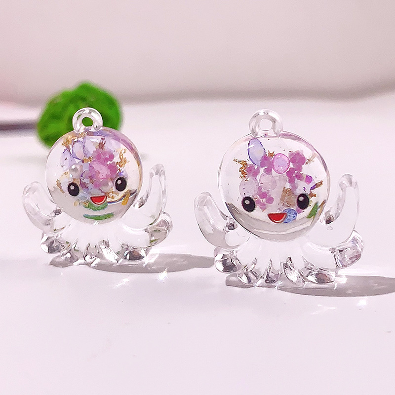 Nuevos accesorios de pulpo nocturno marino serie de cristal octopus llavero colgante DIY material pendiente