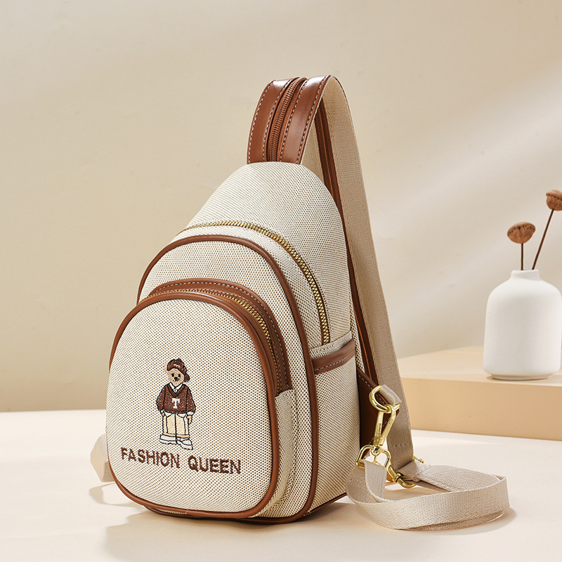 Mochila de dibujos animados 2025 nueva moda simple bolso de pecho casual mujer oso bordado bandolera de todo fósforo