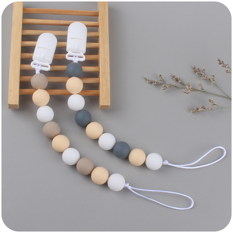 Suministros para bebés Cadena de chupete creativo bebé silicona mordedura molar anti-gota cadena dos conjuntos