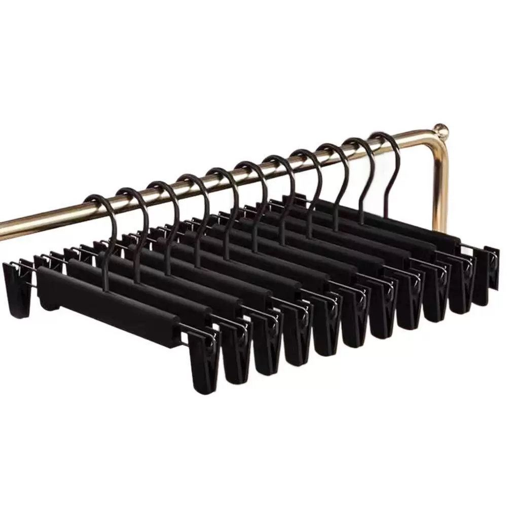 Trousers, storage system, universal hanger