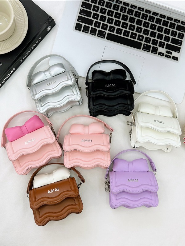 Primavera nuevo estilo coreano mini bolso de hombro de los niños pu arco cadena mensajero bolsa de hombro de las niñas bolsa padre-niño bolsa