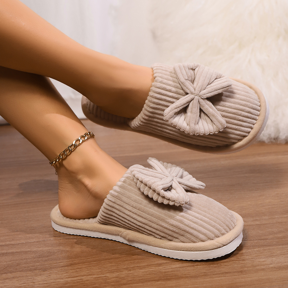 Nuevas zapatillas de algodón transfronterizas otoño y invierno parejas de arco de algodón para el hogar calentamiento interior de las zapatillas de algodón para hombres y mujeres