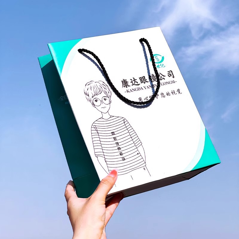 眼镜店手提袋印刷纸袋眼科白卡视力包装袋礼品袋印刷logo袋子