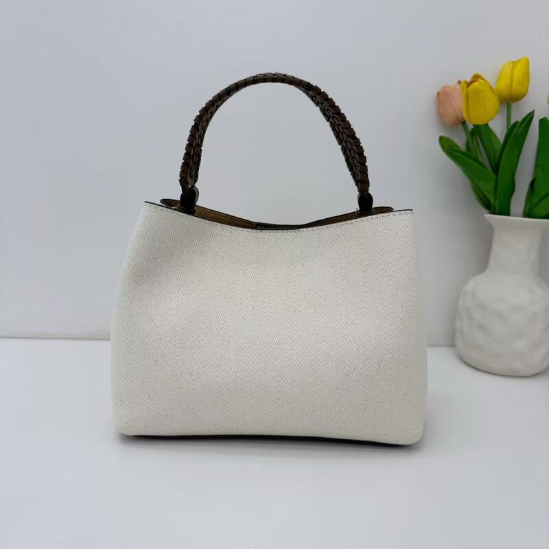 2026 Spring/Summer New Women's Bag with Woven Handle, Magnetic Closure, Versatile Commuter Canvas Handbag