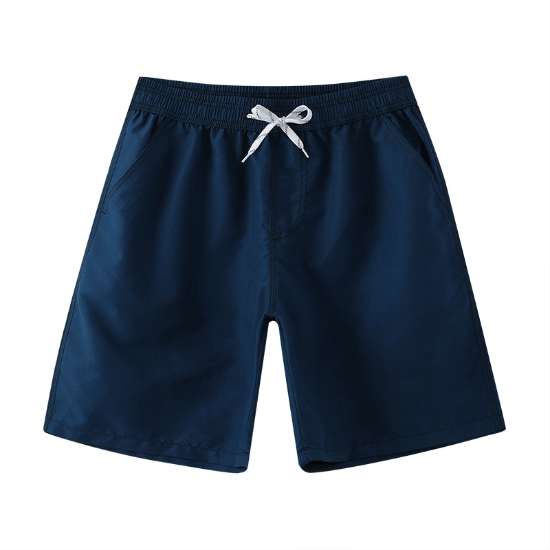 Pantalones cortos de playa para hombre, pantalones cortos de color sólido, pantalones cortos de baño de secado rápido, pantalones cortos deportivos informales y holgados para vacaciones en aguas termales.