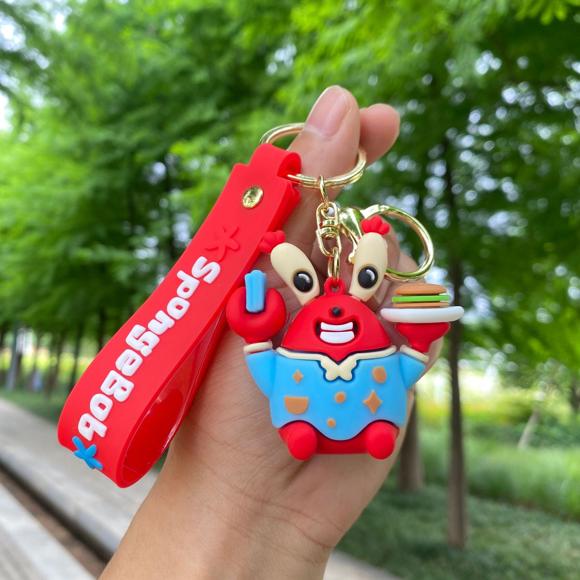 Dibujos animados esponja bebé Paida estrella llavero muñeca colgante coche llavero empuje muñeca máquina regalo al por mayor