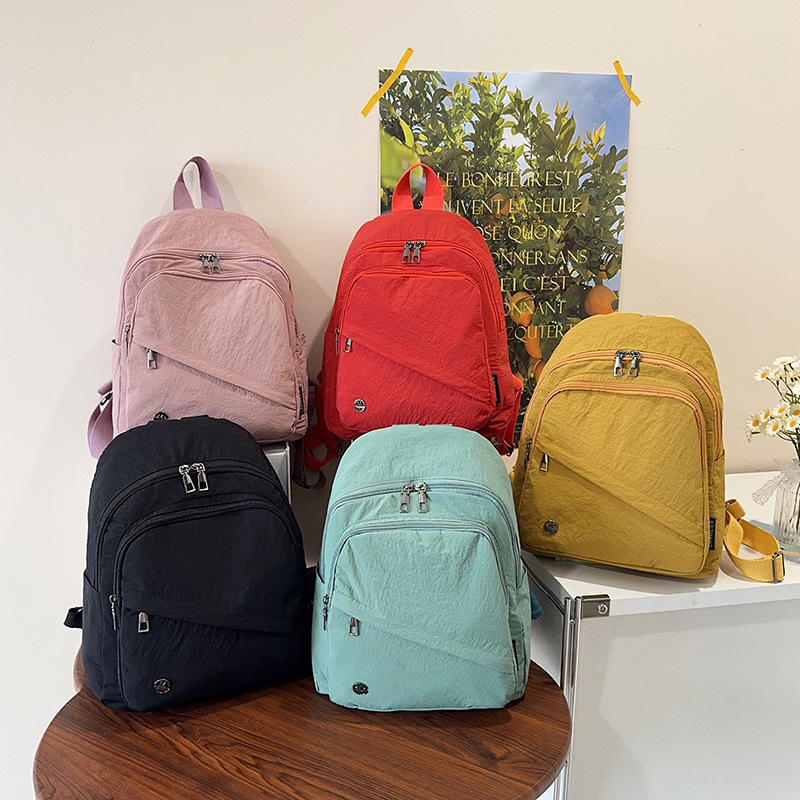 跨境简约时尚双肩包防泼水超轻休闲学生书包小众百搭运动旅行背包