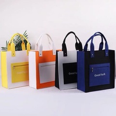 ジッパー型の色合わせフェルトバッグ学生の高颜値型ハンドバッグ弁当箱カジュアルでシンプルなファッション
