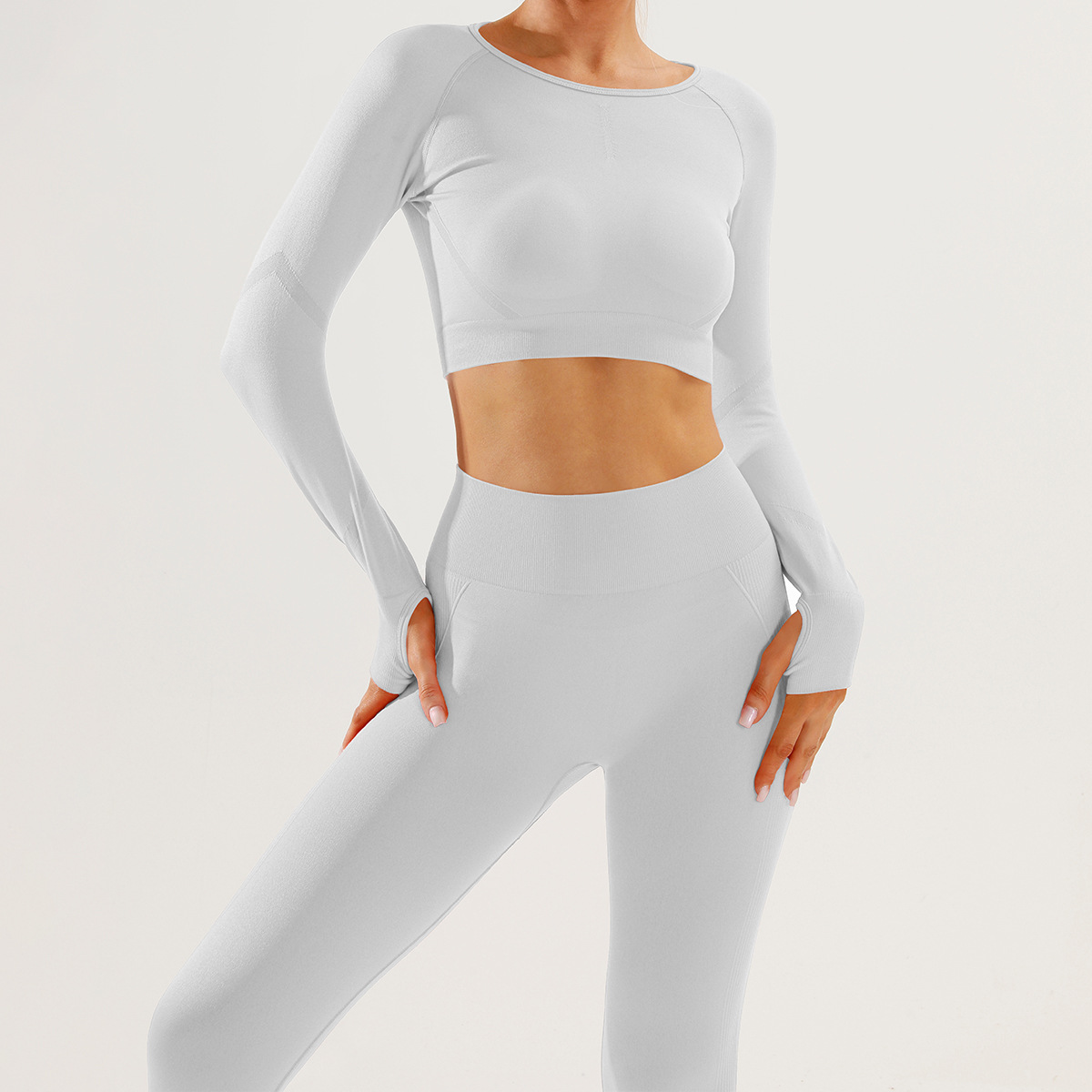 Traje de ropa de yoga sonriente sin costuras europeo y americano, pantalones de manga larga para mujer, traje de dos piezas, traje de pantalones de fitness de cadera de miel sonriente delgado