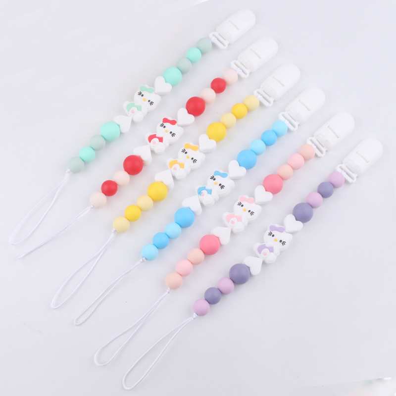 Nuevo KT gatos niños de silicona chupeta clips cadena bebé mordida cadena de dientes molares cadena anti-caída cadena pacificadora chupeta de goma de dente