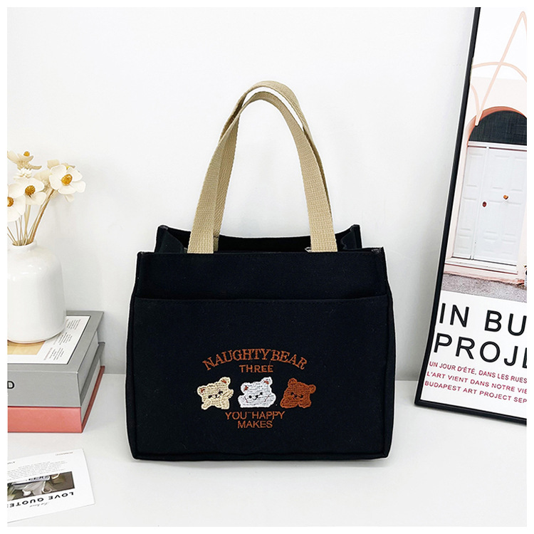 New wholesale fashionable and high-quality canvas handbag, simple and portable, easy to carry for going out, versatile lunch box and bento bag undefined