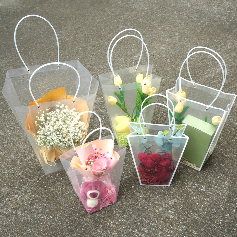 Fábrica directa transparente ramo de flores bolsa de mano floral bolsa de embalaje ventana trapezoidal de plástico PVC regalos de mano