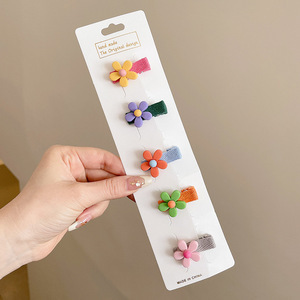 Hermosos clips de cabello de color para niños coreanos de alto nivel sensación de arco de niñas bolsa de tela no daña clips de cabello de bebé