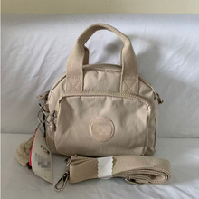 2025K家尼龙猴子包都市简约时尚帆布贝壳包手提斜挎两用包KI4777