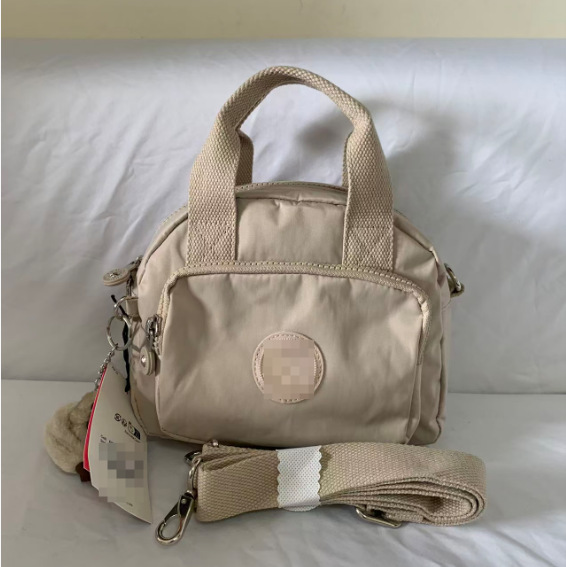 2025K家尼龙猴子包都市简约时尚帆布贝壳包手提斜挎两用包KI4777