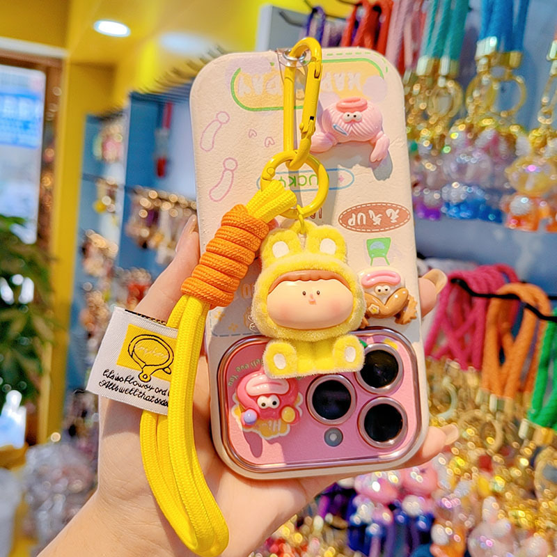 Caricatura floc amarelis llavero de automóvil pareja colgante bolsos creativos colgar garra máquina regalos al por mayor